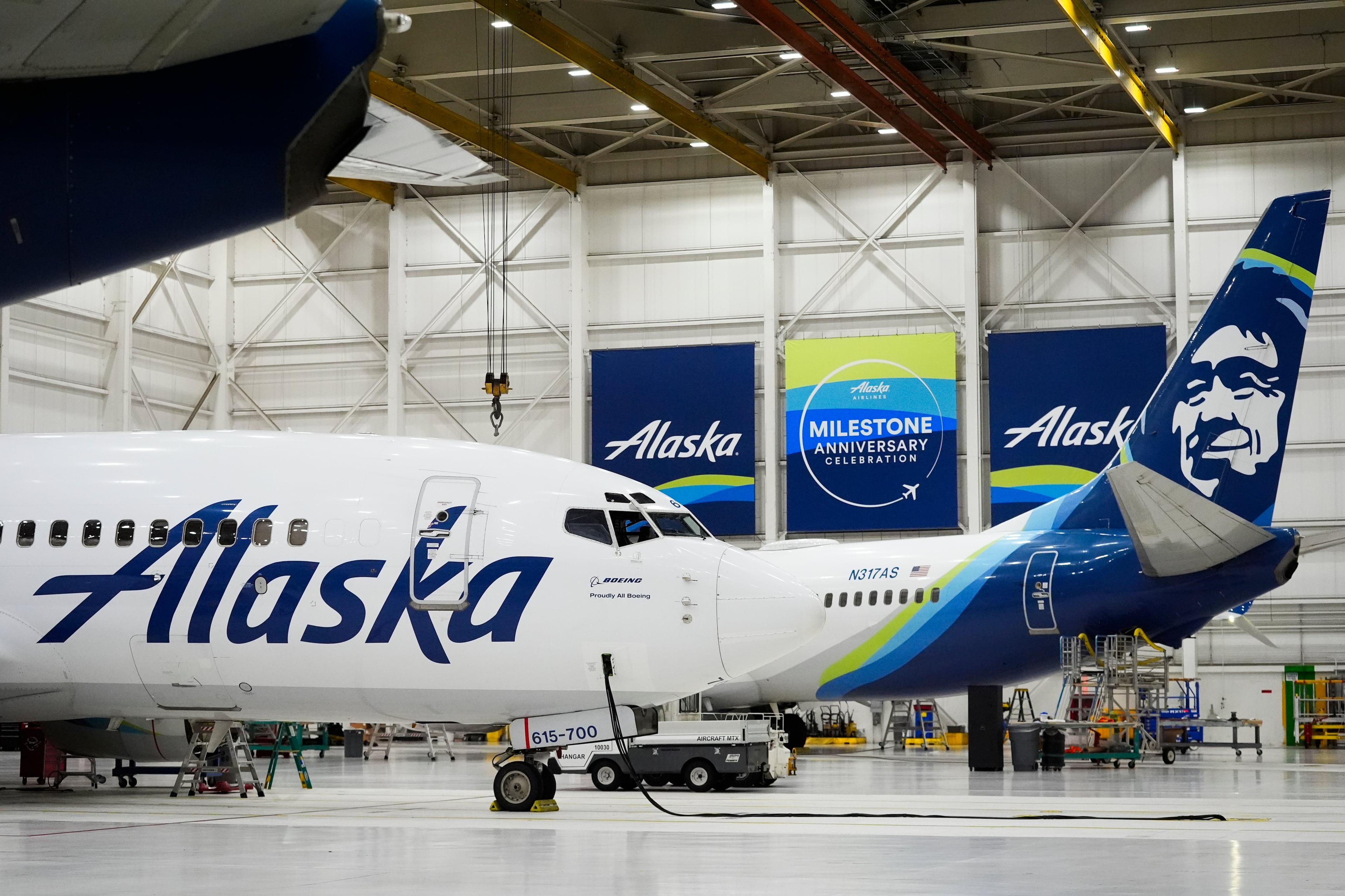 An Alaska Airlines aircraft sits in the airline's hangar at Seattle-Tacoma International Airport in SeaTac, Washington. Alaska is headquartered in Seattle. (Lindsey Wasson/AP File)