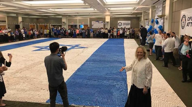 The Guinness World Record for the largest cookie mosaic flag was achieved by the Atlanta Jewish community at Congregation Beth Jacob on June 3.