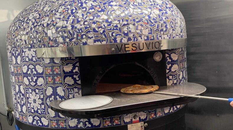 Vesuvio has a Manna pizza oven imported from Naples.