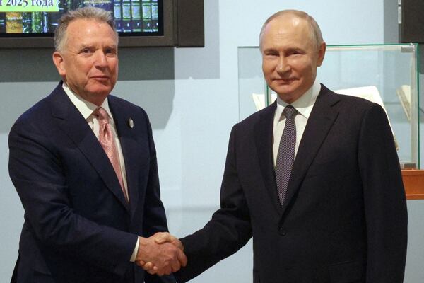 Russian President Vladimir Putin, right, and U.S. President Donald Trump's special envoy Steve Witkoff shake hands prior to their talks in St. Petersburg, Russia, Friday, April 11, 2025. (Gavriil Grigorov, Sputnik, Kremlin Pool Photo via AP)