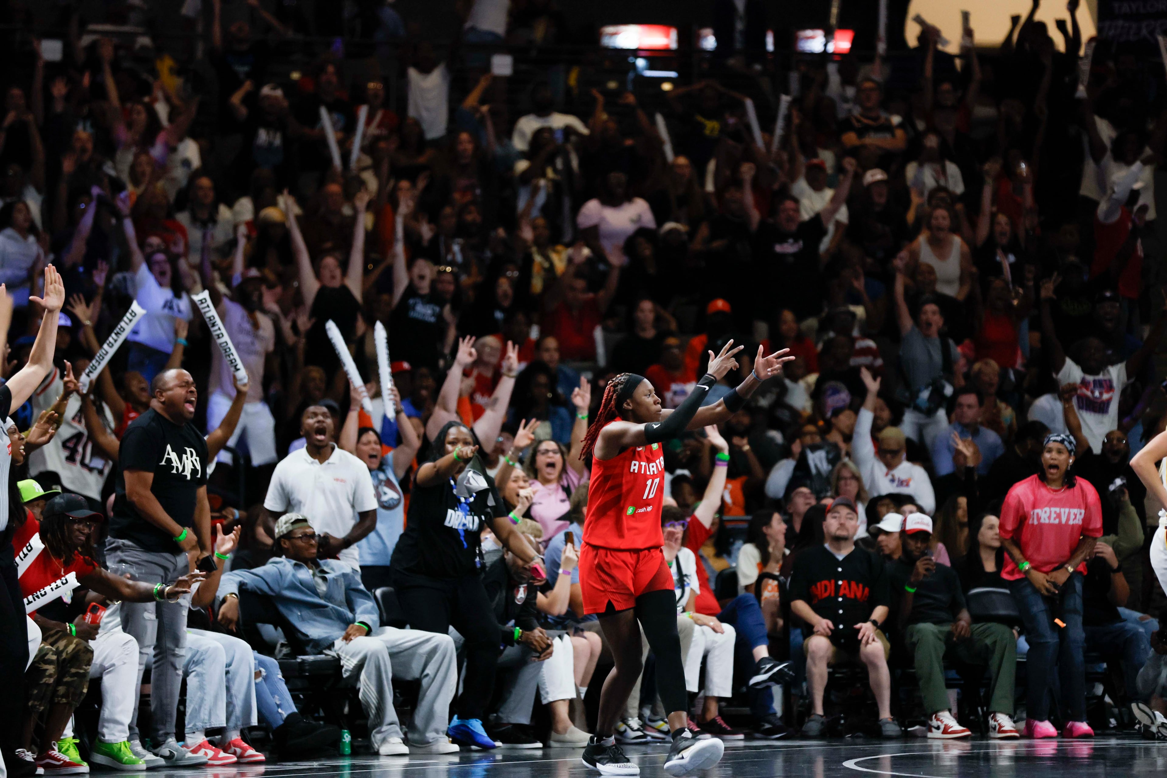Atlanta Dream guard Rhyne Howard (10) reacts after a three-pointer during the second half of a WNBA playoff first-round game against the Indiana Fever at Gateway Center Arena on Thursday, Sept. 18, 2024, in Atlanta. (Miguel Martinez/ AJC)