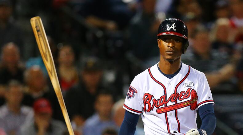 B.J. Upton tosses his bat away on Sept. 24, 2014. CURTIS COMPTON / CCOMPTON@AJC.COM B.J./Melvin Upton arrived in camp with a new name but will it be same player? (Curtis Compton, AJC)