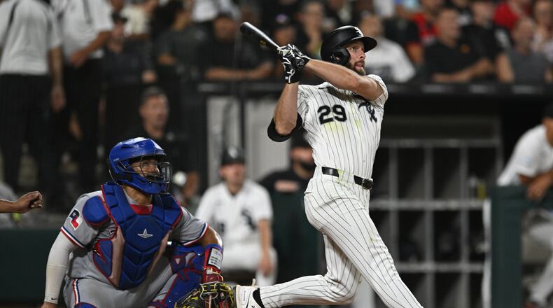 Chicago White Sox's Tristan Peters watches his two-run home during the fifth inning of a baseball game against the Texas Rangers in Chicago, Wednesday, Aug. 26, 2026. (AP Photo/Paul Beaty)