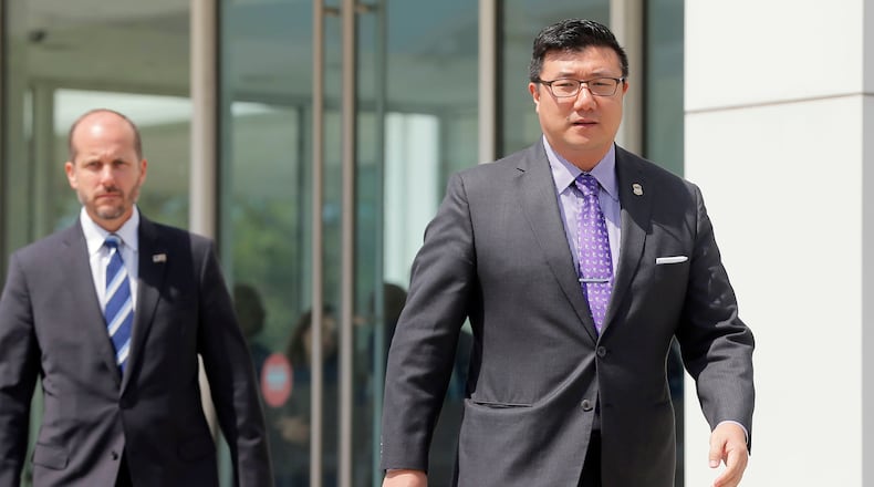 U.S. Attorney Byung J. “BJay” Pak (right) said defendant Timothy Cobb “gambled on getting away with his scheme, but he lost.” (BOB ANDRES /BANDRES@AJC.COM)