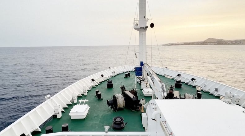 The Dutch-flagged MV Hondius, a cruise ship carrying nearly 150 people remains off Cape Verde on Monday, May 4, 2026 after three passengers died and several others fell seriously ill in a suspected hantavirus outbreak. (Qasem Elhato via AP)