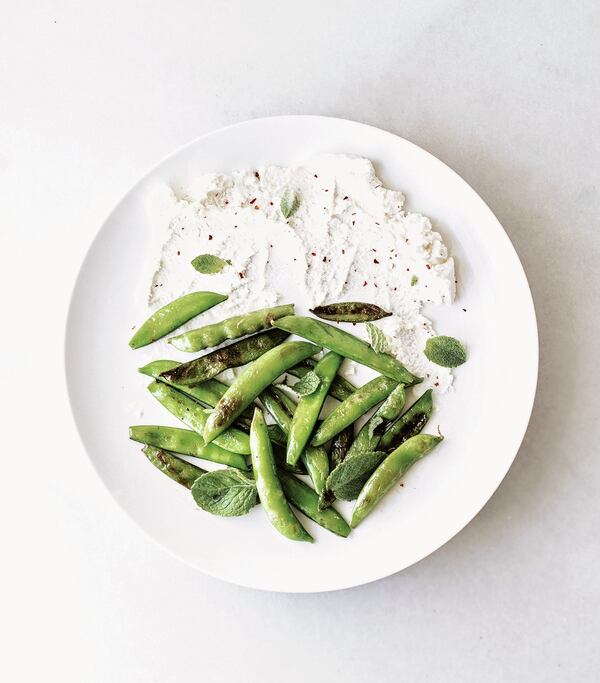 Charred Snap Peas with Chive Vinaigrette and Whipped Ricotta from “The Vegetable Gardener’s Cookbook” by Danielle Majeika (Page Street Publishing, $21.99).