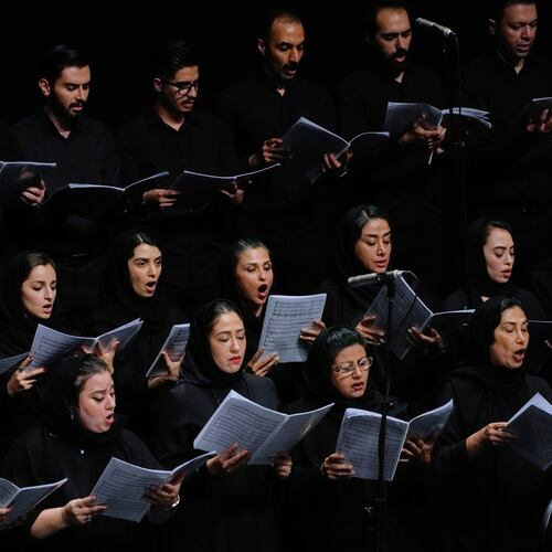 Choir performs in a Tehran Symphony Orchestra performance at Unity Hall in Tehran, Iran, Thursday, Aug. 6, 2026. (AP Photo/Vahid Salemi)