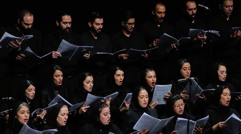 Choir performs in a Tehran Symphony Orchestra performance at Unity Hall in Tehran, Iran, Thursday, Aug. 6, 2026. (AP Photo/Vahid Salemi)