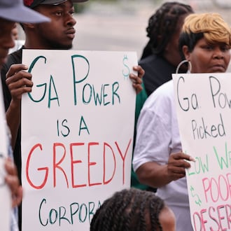 Vine City residents gather to rally against the new Georgia Power substation being built in the neighborhood in Atlanta on Thursday, June 5, 2025. (Natrice Miller/AJC)
