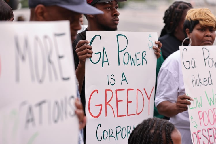 Vine City residents gather to rally against the new Georgia Power substation being built in the neighborhood in Atlanta on Thursday, June 5, 2025. (Natrice Miller/AJC)