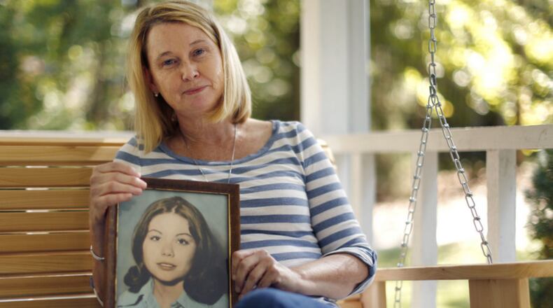 Oct. 16, 2015 - Dacula - Paula Ashmore at home in Dacula, with the colorize passport photo of Vicki. BOB ANDRES / BANDRES@AJC.COM
