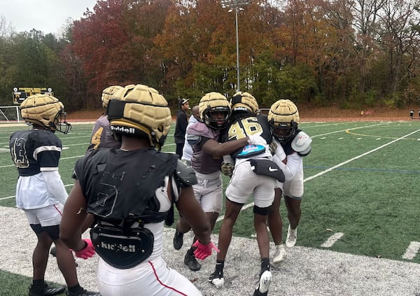 Douglass football players are enjoying the fruits of an impressive rebuild under coach Stanley Pritchett. The Astros are practicing during Thanksgiving week for the first time in six years. (Jack Leo/AJC)