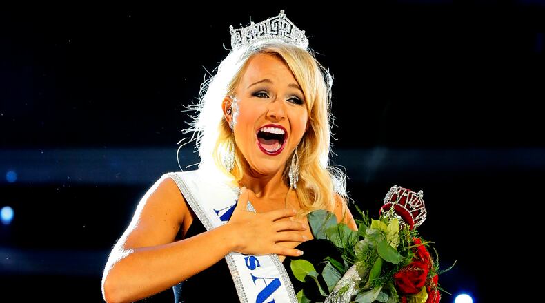 Miss Arkansa Savvy Shields waves to crowd after being named new the Miss America 2017, Sunday, Sept. 11, 2016, in Atlantic City, N.J. (AP Photo/Noah K. Murray)