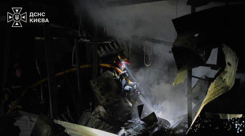 In this photo provided by the Ukrainian Emergency Service, firefighters put out a fire following a Russian missile attack in Kyiv, Ukraine, Tuesday, Sept. 1, 2026. (Ukrainian Emergency Service via AP)