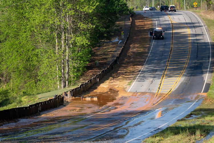 A section of Buford Highway, between Duluth and Suwanee, is closed as crews repair a water main break on Tuesday, April 14, 2026. (Ben Hendren for the AJC)