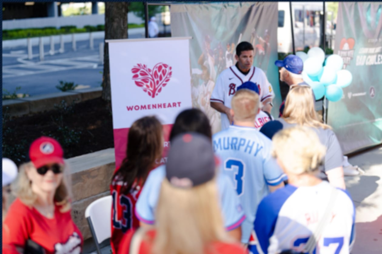 Former Atlanta Braves catcher Javy Lopez speaks with fans about heart disease risks as part of the “Playing with Heart” initiative. (Courtesy of the Atlanta Braves)