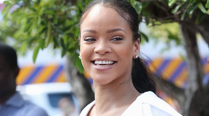 Rihanna, a native of Barbados, is pictured here attending the Barbados National HIV/AIDS Commission  in Bridgetown in Dec. of 2016. She’s drawing social media attention for her Instagram posts showing Queen Elizabeth’s Photoshopped head on her body dressed in revealing outfits.