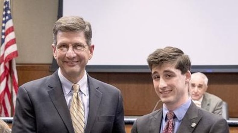 (L-R) Former Marietta Councilman Philip Goldstein stands with his son, current Ward 7 Marietta Councilman Joseph Goldstein. Joseph brought up the matter on March 11 of possibly including citizen comments in the City Council minutes. AJC file photo