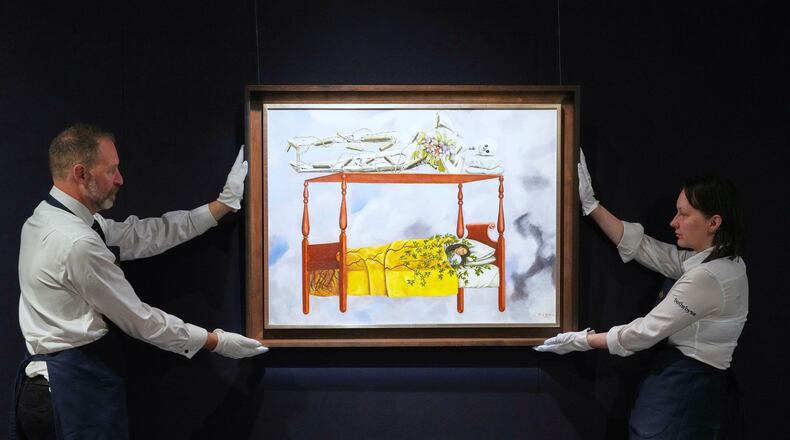 FILE - A painting by Frida Kahlo titled "El sueño (La cama)" or (The Dream (The Bed), is displayed at Sotheby's auction rooms in London, Sept. 19, 2025. The painting, estimated at 40-60 million US dollars, is part of a collection of surrealist masterpieces unveiled ahead of its upcoming sale in New York. (AP Photo/Kirsty Wigglesworth, File)