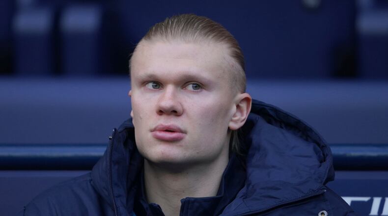 Manchester City's Erling Haaland sits in the dug out before the start of the English Premier League soccer match between Manchester City and Wolverhampton Wanderers in Manchester, England, Saturday, Jan. 24, 2026. (AP Photo/Ian Hodgson)