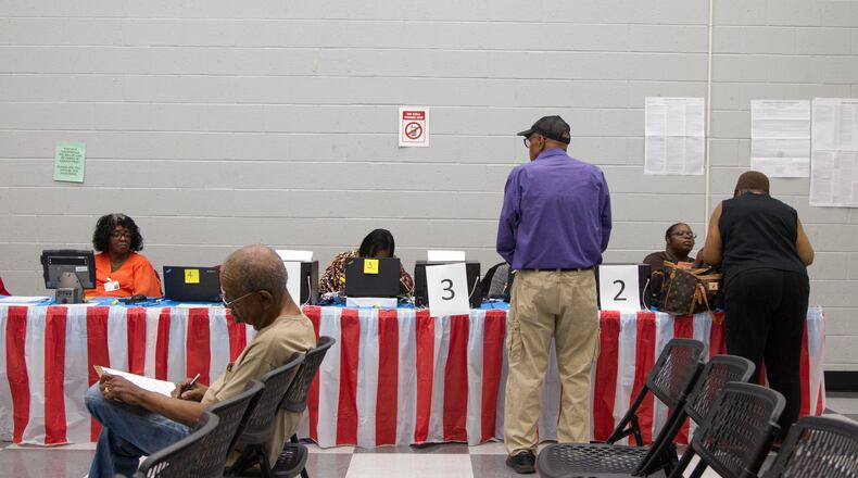 People take part in Saturday early voting at the C.T. Martin Natatorium and Recreation Center in Atlanta, Georgia, on Saturday, May 12, 2018. (REANN HUBER/REANN.HUBER@AJC.COM)