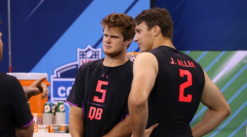 USC QB Sam Darnold (5) didn't throw at the NFL scouting combine Saturday. But Wyoming's Josh Allen sure did.