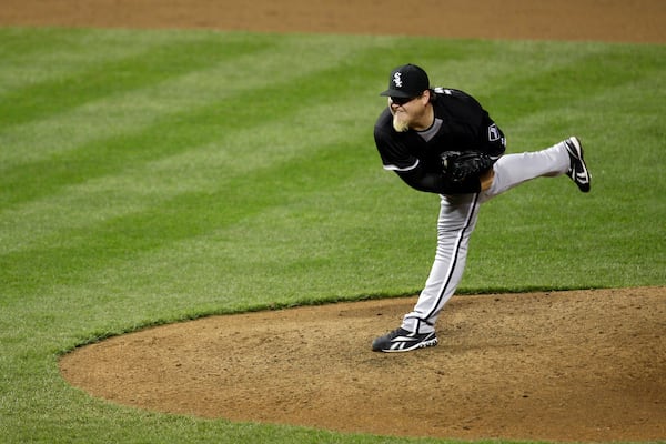 FILE - Chicago White Sox relief pitcher Bobby Jenks throws to a Baltimore Orioles batter during a baseball game, April 23, 2009, in Baltimore. (AP Photo/Rob Carr, File)