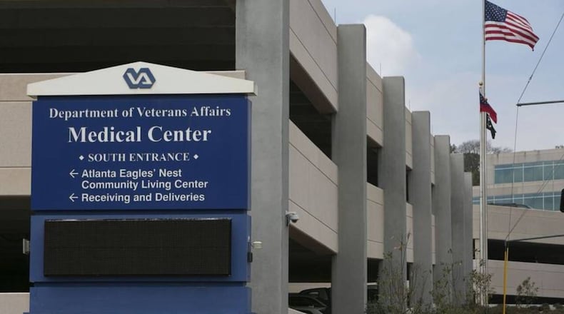 John Robert Smith Jr., 58, was shot and killed at the Atlanta VA Medical Center after he pulled a knife from his belongings, according to DeKalb County officials.