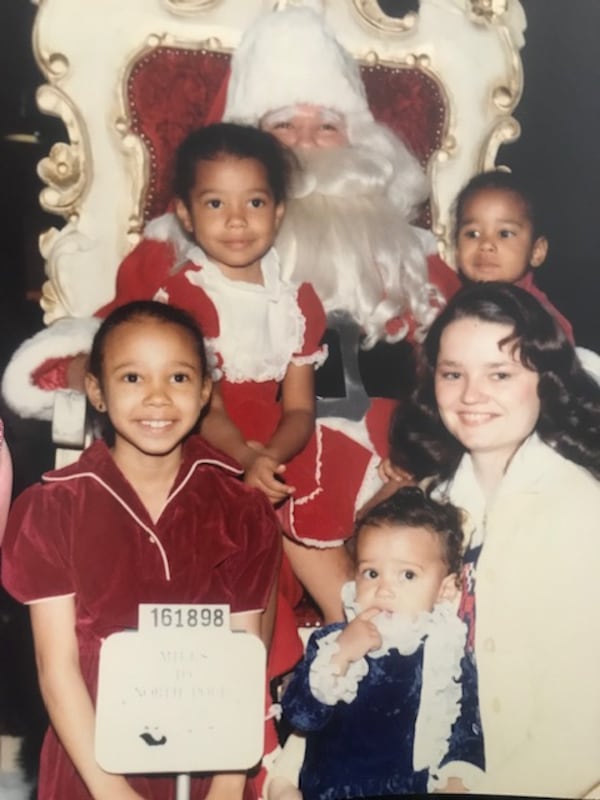 The Goodson girls pose with their mother Glenda Goodson (and Santa). (Courtesy of Kristy Reese and Kimberly Gibbs)