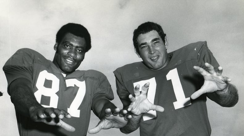 John Zook (right) strikes a pose with fellow Falcons defensive end Claude Humphrey in 1972. (AJC Archive/Charles R. Pugh/staff)
