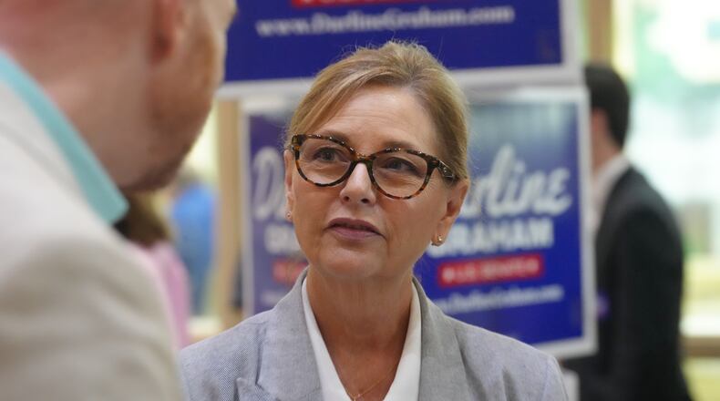 Sen. Darline Graham, R-S.C., speaks with voters following a Senate candidate stump event ahead of a special GOP primary to select a replacement for her late brother, Sen. Lindsey Graham, Saturday, Aug. 1, 2026, in Lexington, S.C. (AP Photo/Meg Kinnard)