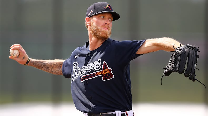 Mike Foltynewicz delivers a pitch during the first live batting sessions at spring training. (Curtis Compton/ccompton@ajc.com)