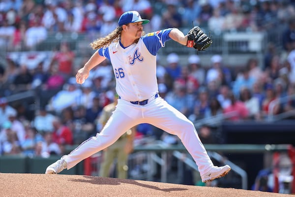 Atlanta Braves pitcher Grant Holmes (66) delivers in the first inning of a baseball game against the San Diego Padres, Saturday, May 24, 2025, in Atlanta. (AP Photo/Colin Hubbard)