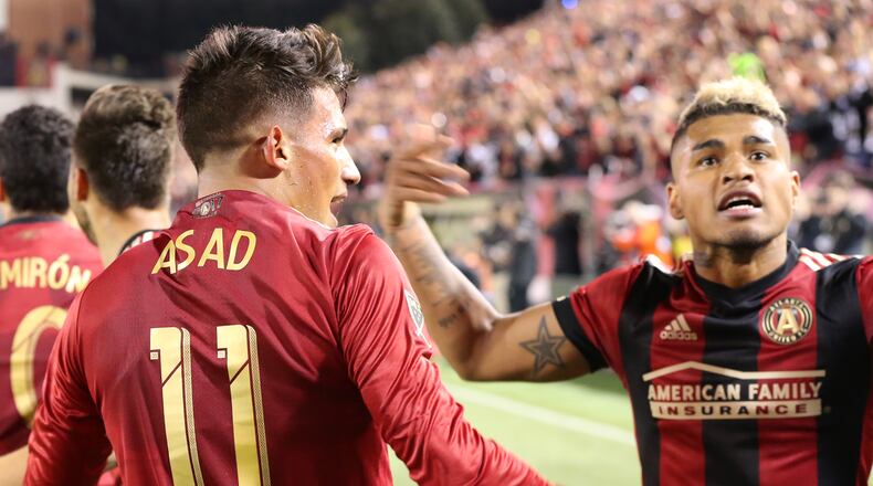 March 5, 2017, Atlanta: Atlanta United Yamil Asad (left) and Josef Martinez celebrate after Asad scores against the N.Y. Red Bulls during their first game in franchise history on Sunday, March 5, 2017, in Atlanta.   Curtis Compton/ccompton@ajc.com