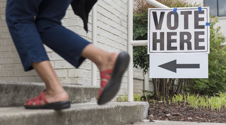 A voter walks into Mount Zion United Methodist Church in Marietta, Georgia, on Tuesday, April 18, 2017. Cobb, Fulton and North DeKalb residents cast ballots today for the highly contested 6th Congressional District race. (DAVID BARNES / DAVID.BARNES@AJC.COM)