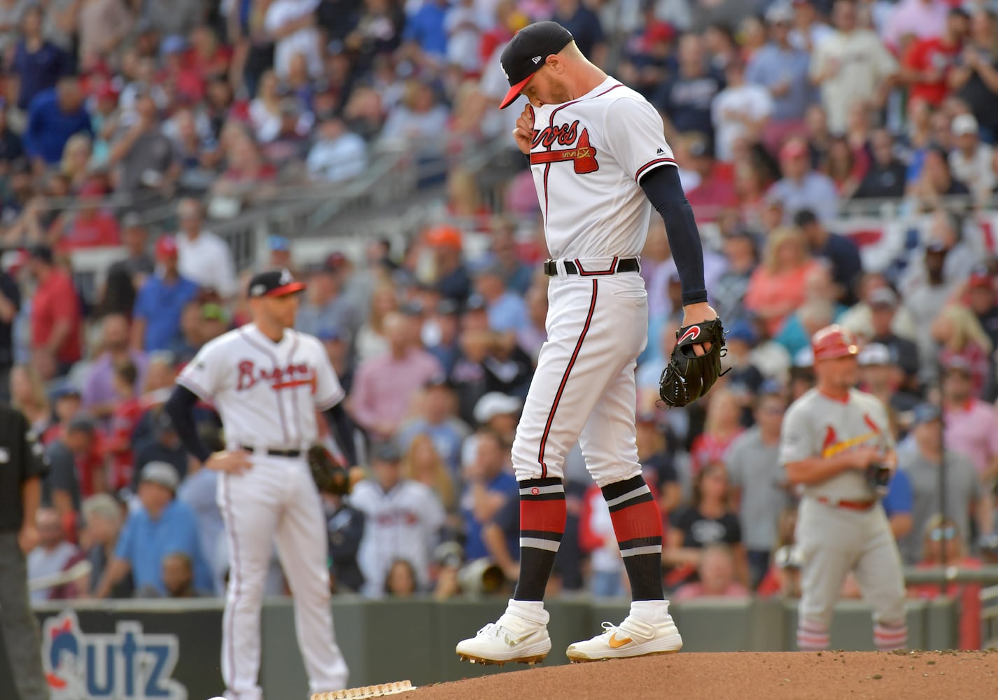 Photos: Braves fall way behind the Cardinals