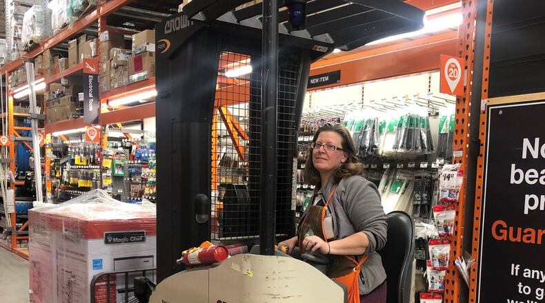 Although she has a bacehlor’s degree in history and minor in political science, Victoria Taylor doesn’t have a teaching certificate so she works part time as a substitute teacher in the Gwinnett County Public Schools System. She’s a full time employee at the Home Depot location in Tucker. Since substitutes don’t get paid unless they work, she’ll try to get more hours at the home improvement store while the district is implementing Digital Learning Days. ARLINDA SMITH BROADY/AJC