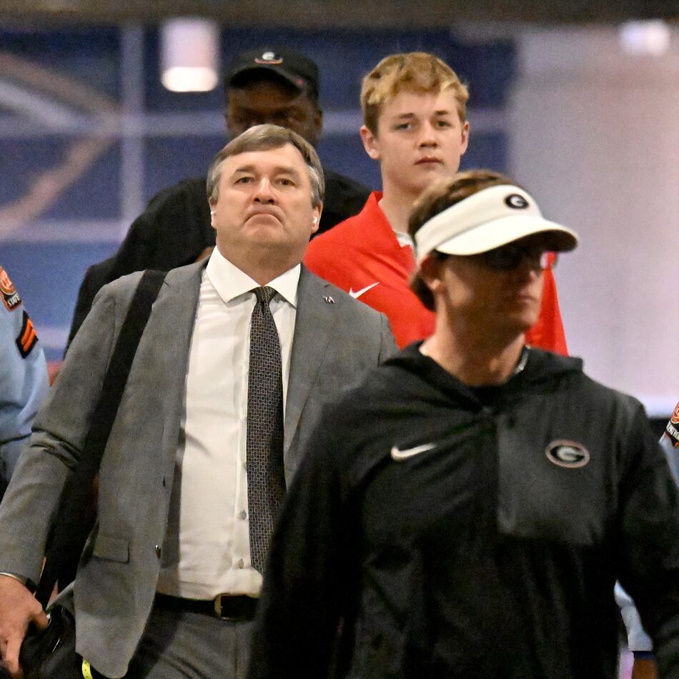 Georgia head coach Kirby Smart arrives with players and coaching staff before the Sugar Bowl on Jan. 1. Although Smart's name was mentioned in an answer about the new Falcons coach, he has said he prefers college ball. (Hyosub Shin/AJC)