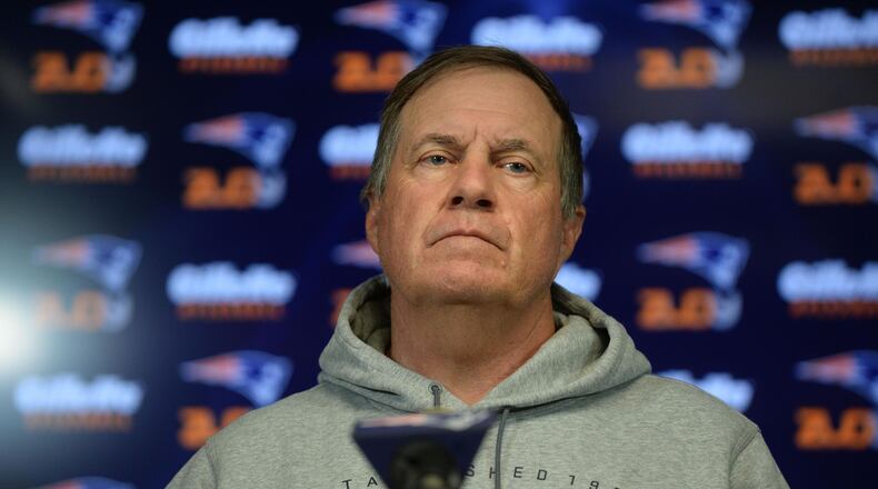FILE PHOTO: New England Patriots head coach Bill Belichick speaks at a press conference. There are reports that he could join President Donald Trump's "Council on Sports, Fitness, and Nutrition." (Photo by Darren McCollester/Getty Images)