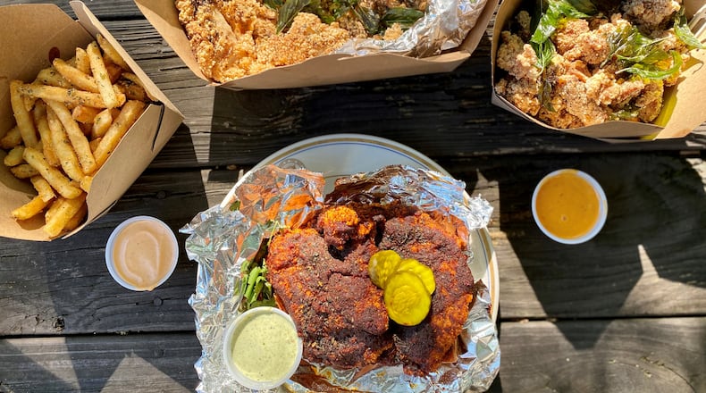A selection of takeout items from Java Saga Coffee includes fries; the BFC (large Taiwanese fried chicken cutlet); classic Taiwanese chicken nuggets; and a hot chicken sandwich. Wendell Brock for The Atlanta Journal-Constitution