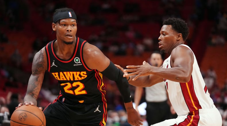 Cam Reddish #22 of the Atlanta Hawks drives to the basket against the Kyle Lowry #7 of the Miami Heat during a preseason game at FTX Arena on Oct. 4, 2021 in Miami, Florida. (Mark Brown/Getty Images/TNS)