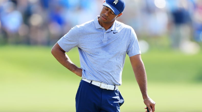 Tiger Woods wears his quadruple bogey face on No. 17 Saturday at the Players Championship. (Sam Greenwood/Getty Images/TNS)