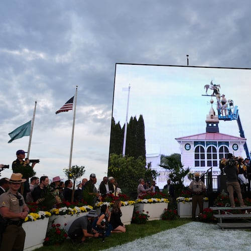 FILE - A broadcast shows staff painting the new colors of Paco Lopez and Napoleon Solo on the Pimlico weather vane after they won the 151st running of the Preakness Stakes horse race, May 16, 2026, at Laurel Park in Laurel, Md. (AP Photo/Julia Demaree Nikhinson, File)