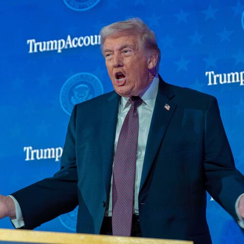 President Donald Trump gestures during the launch of a program known as Trump Accounts at the Andrew W. Mellon Auditorium, Wednesday, Jan. 28, 2026, in Washington. (AP Photo/Jose Luis Magana)