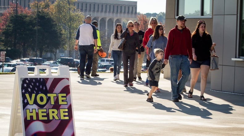 Cobb County residents file into the Cobb County Civic Center in Marietta for early voting on Saturday, Oct. 29, 2016. At least 2,000 people were expected to participate in the early voting there Saturday. STEVE SCHAEFER / SPECIAL TO THE AJC