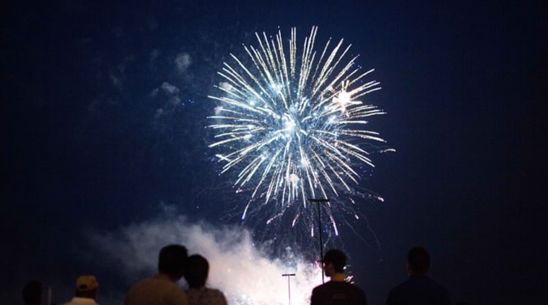Milton is moving to limit loud fireworks to certain holidays, under a recently passed state law that allows localities to regulate the devices. AJC FILE