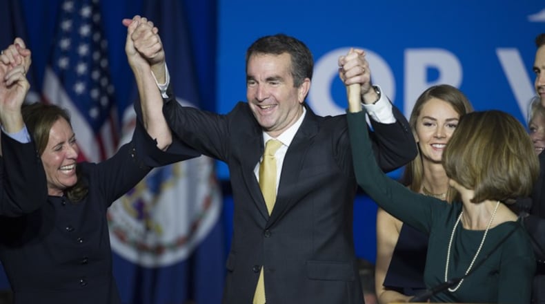 Virginia Gov.-elect Ralph Northam celebrates his election victory Tuesday in Fairfax, Va. (AP Photo / Cliff Owen)