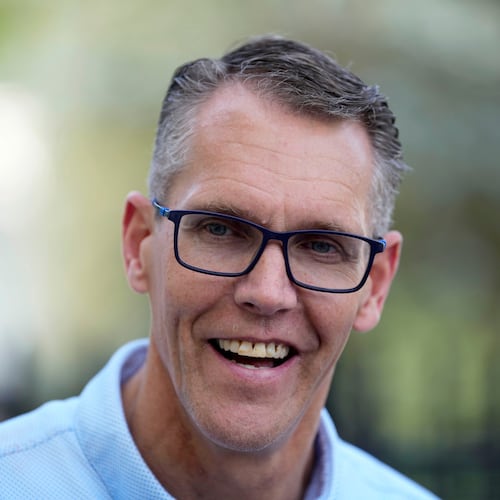 Rep. Randy Feenstra, R-Iowa, campaigns for the Republican nomination for governor during a rally with local residents, Wednesday, May 27, 2026, in West Des Moines, Iowa. (AP Photo/Charlie Neibergall)