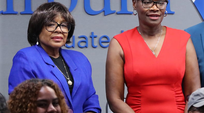 Councilwoman Hattie Portis-Jones (left) and Mayor Elizabeth Carr-Hurst (right) watch over a park and recreation award presentation during the City Council work session and council meeting on Monday, Aug. 12, 2019, in Fairburn. CURTIS COMPTON/CCOMPTON@AJC.COM