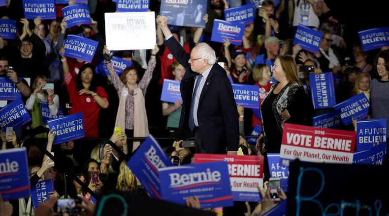 DES MOINES, IA - FEBRUARY 1 : Democratic presidential candidate Bernie Sanders acknowledges the crowd before speaking during his Caucus night event at the at the Holiday Inn February 1, 2016 in Des Moines, Iowa. Sanders was in a virtual tie with Secretary of State Hillary Clinton late in caucus polling. (Photo by Joshua Lott/Getty Images)